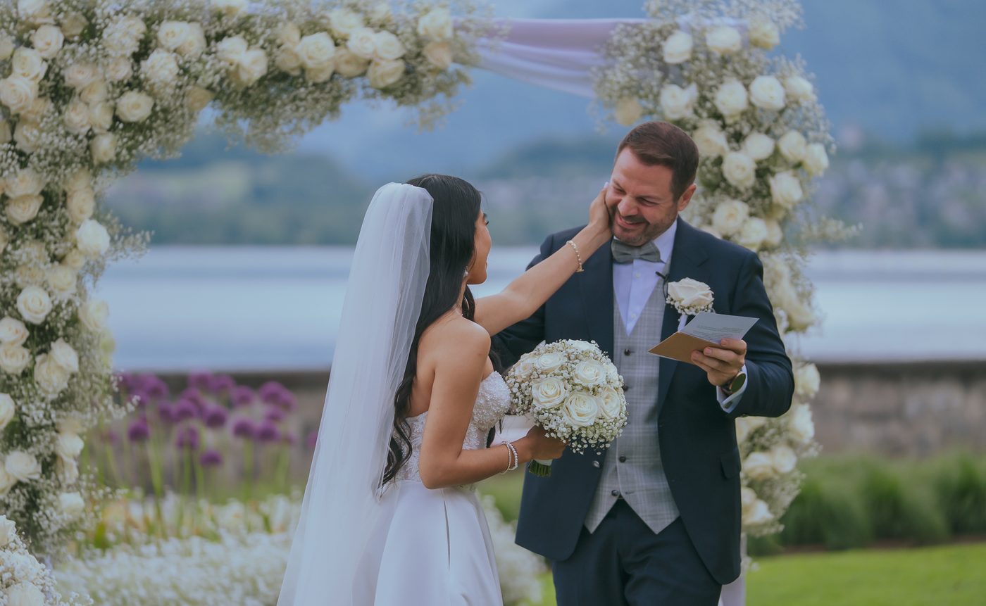 Ceremony beneath a floral arch